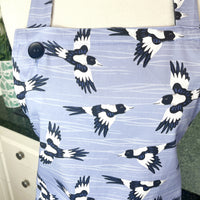 A Stunning Magpie Apron, Ideal for Your Favourite Bird Loving Foodie