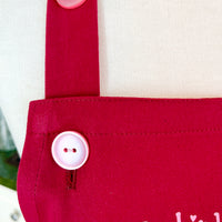 A Beautiful Dark Pink Apron with a Taylor Swift Twist