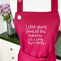 A Beautiful Dark Pink Apron with a Taylor Swift Twist