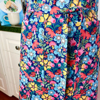 Hunt for the Adorable Butterflies and Mushrooms Within this Lovely Floral Apron