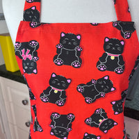 This Bold Red Cat Apron is Perfect for Your Favourite Petite Adult or Teen Cook