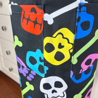 A Bright and Kooky Kid's Apron Covered in Bones
