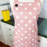 This Dusky Pink Apron is Adorned with Bold Beige Polka Dots