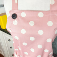This Dusky Pink Apron is Adorned with Bold Beige Polka Dots