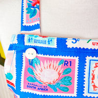 Lots of Vintage Stamps Make This Apron a Retro Delight