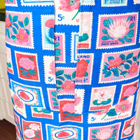 Lots of Vintage Stamps Make This Apron a Retro Delight