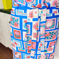 Lots of Vintage Stamps Make This Apron a Retro Delight