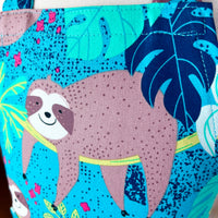 This Toddler's Apron is Covered in the Cutest Sloths
