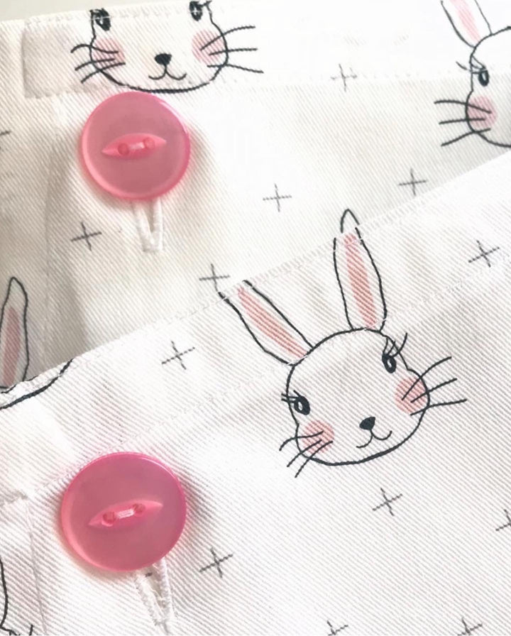 Close up of Bunny Apron with Pink Buttons from the Great Australian Bake Off by My Favourite Apron Co.