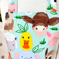 This Toddler's Apron is Covered in All Kinds of Cute Animals