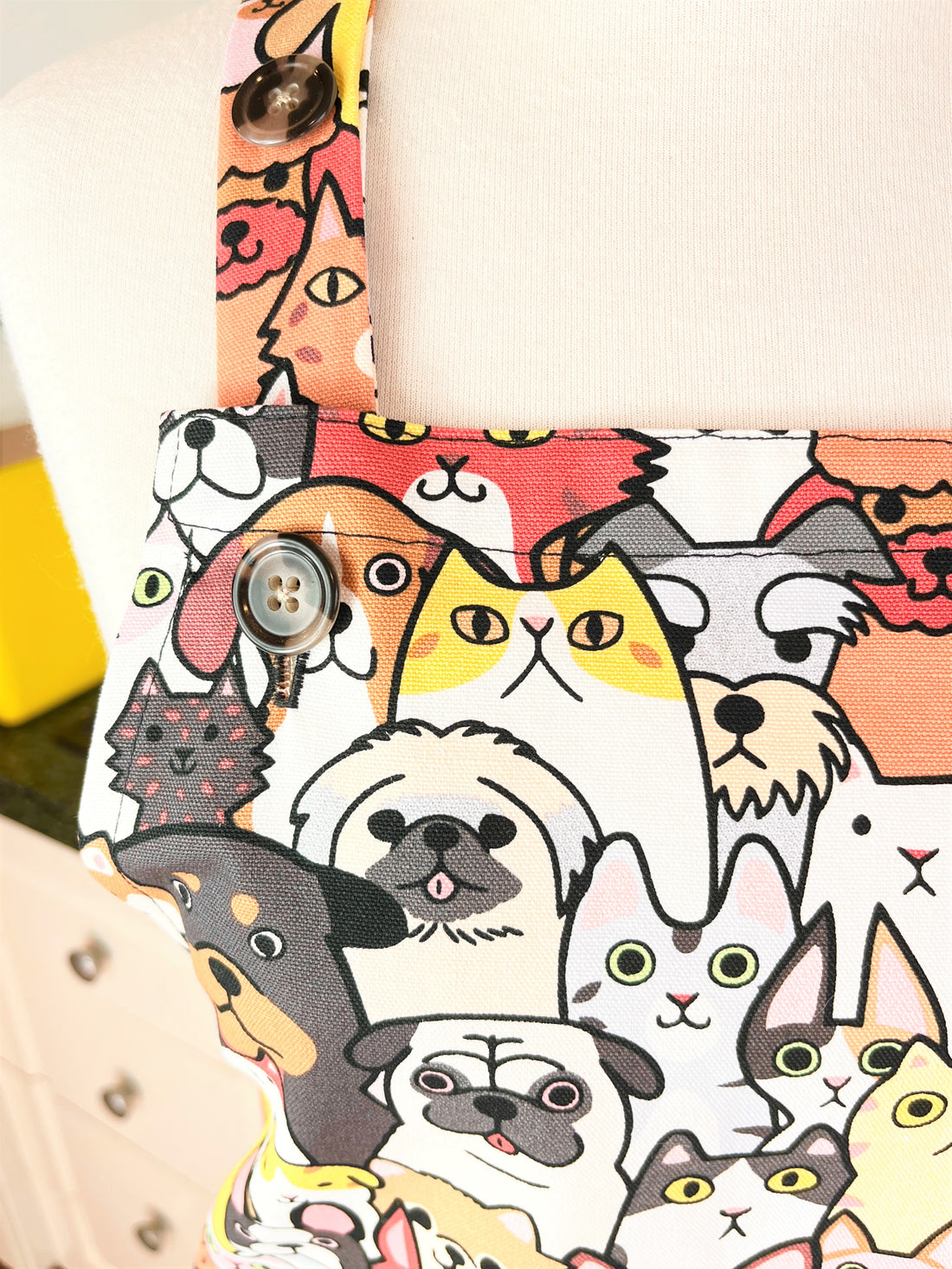 Cats and Dogs Are All Over this Fun Adults' Apron