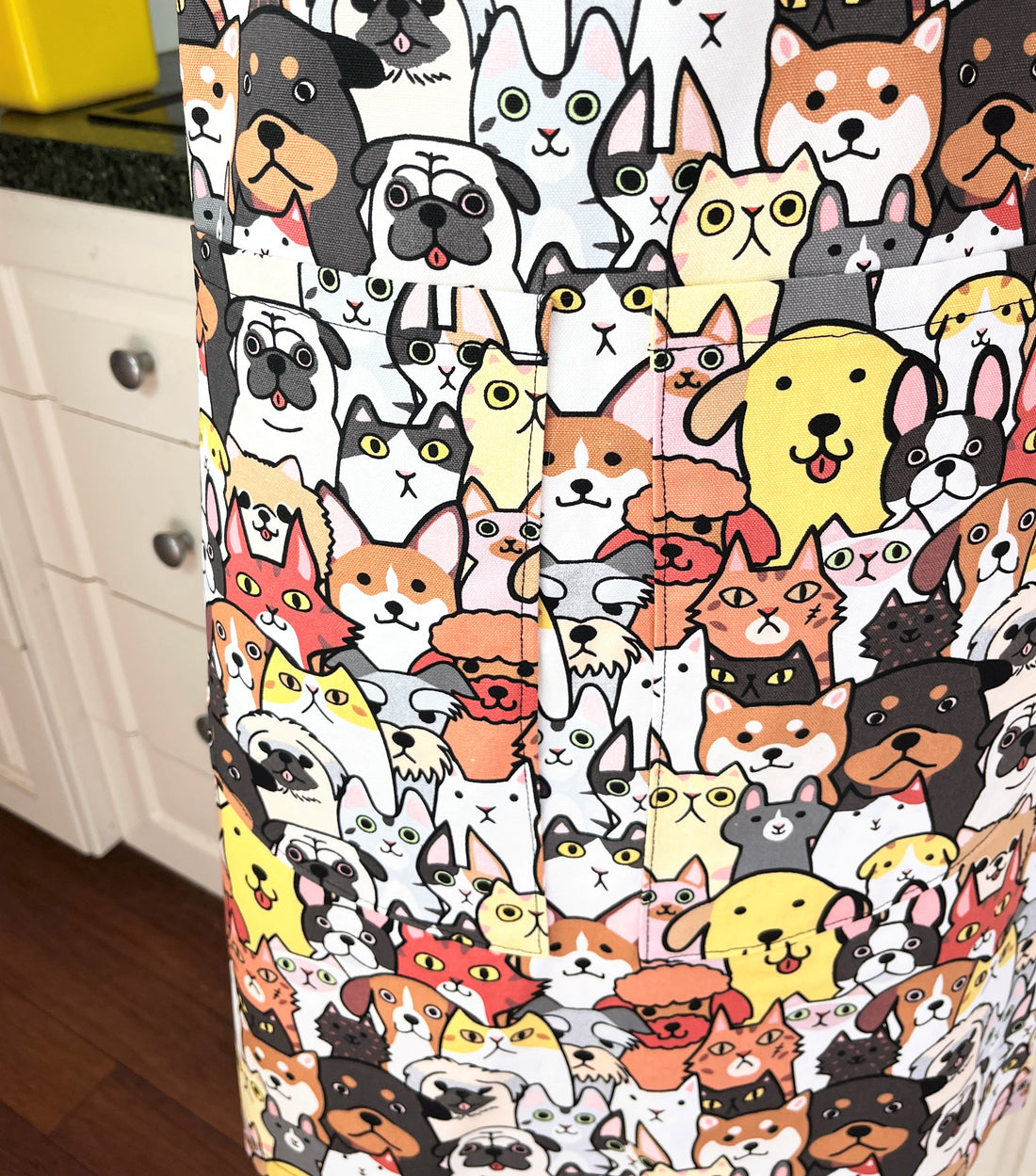 Cats and Dogs Are All Over this Fun Adults' Apron