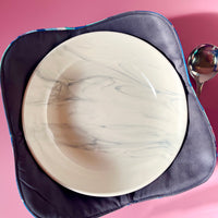 This Cockatoo Bowl Cozy Keeps Your Meal Warm and Your Lap Cool