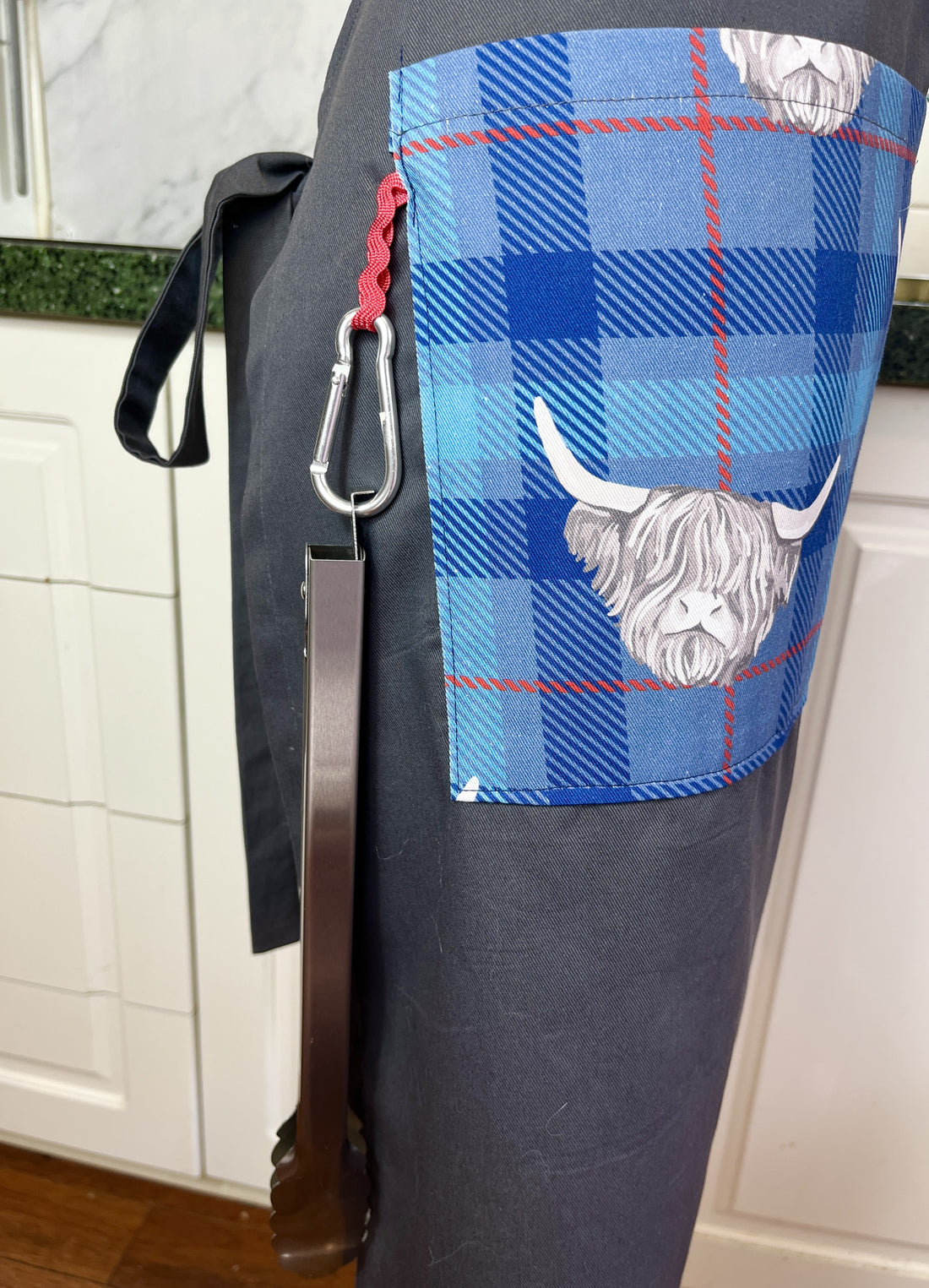 Highland Cows Make this Grey Apron Stand Out this Father's Day