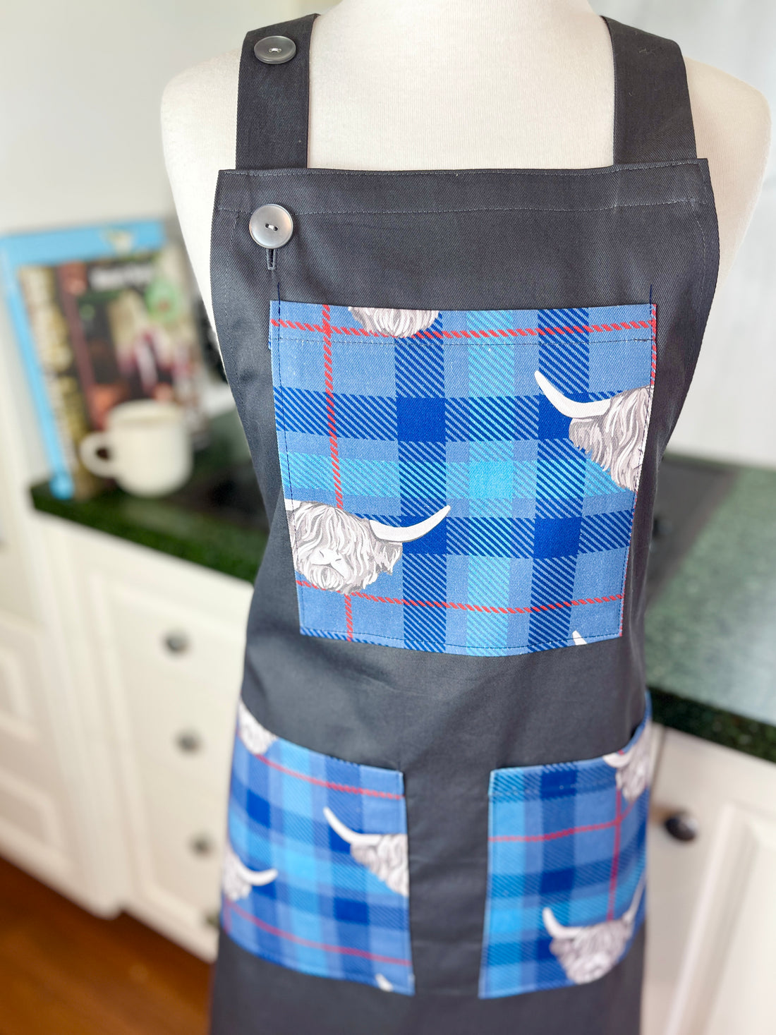 Highland Cows Make this Grey Apron Stand Out this Father's Day