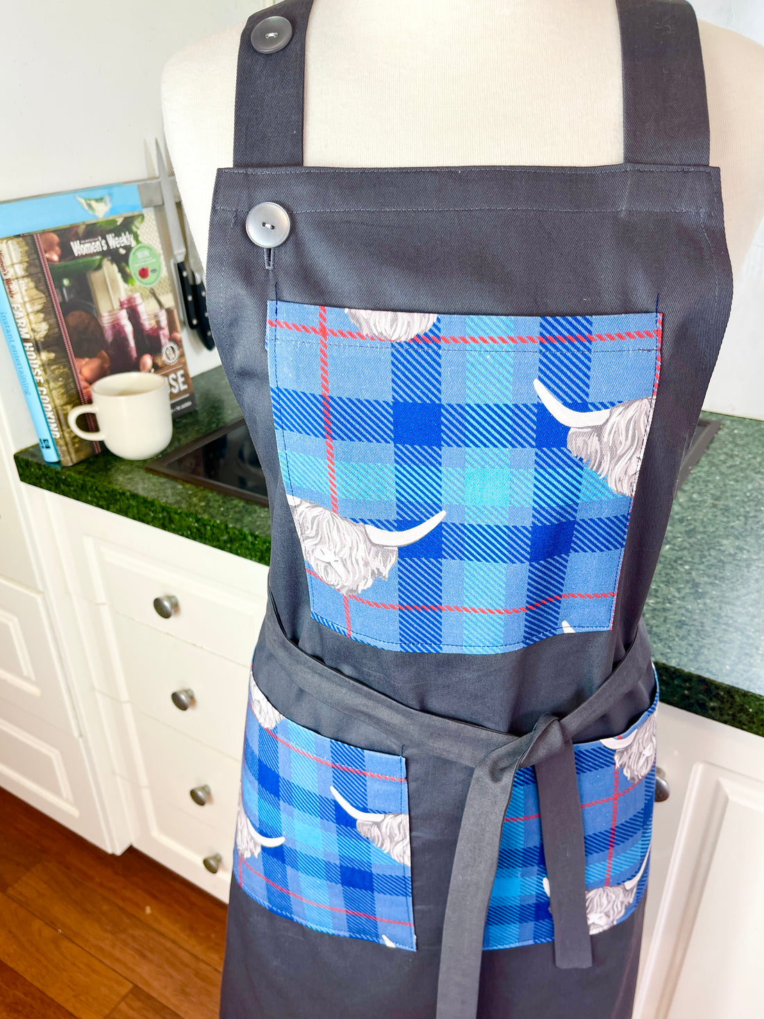 Highland Cows Make this Grey Apron Stand Out this Father's Day