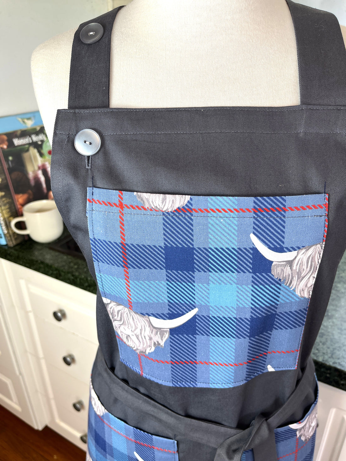 Highland Cows Make this Grey Apron Stand Out this Father's Day