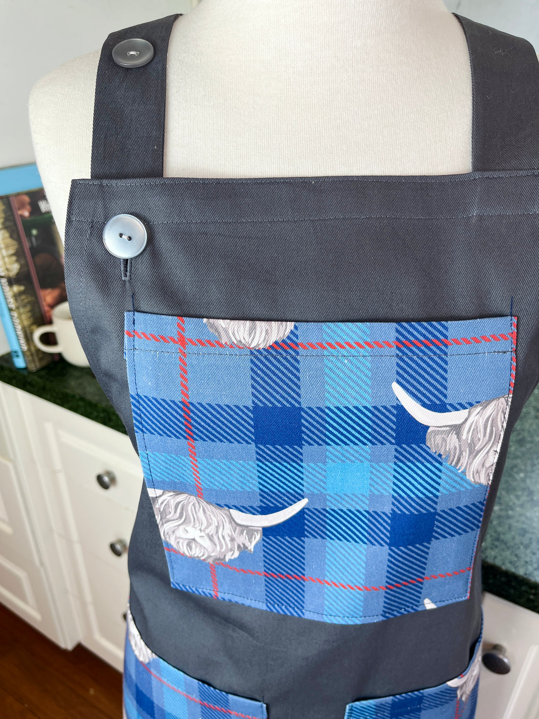 Highland Cows Make this Grey Apron Stand Out this Father's Day