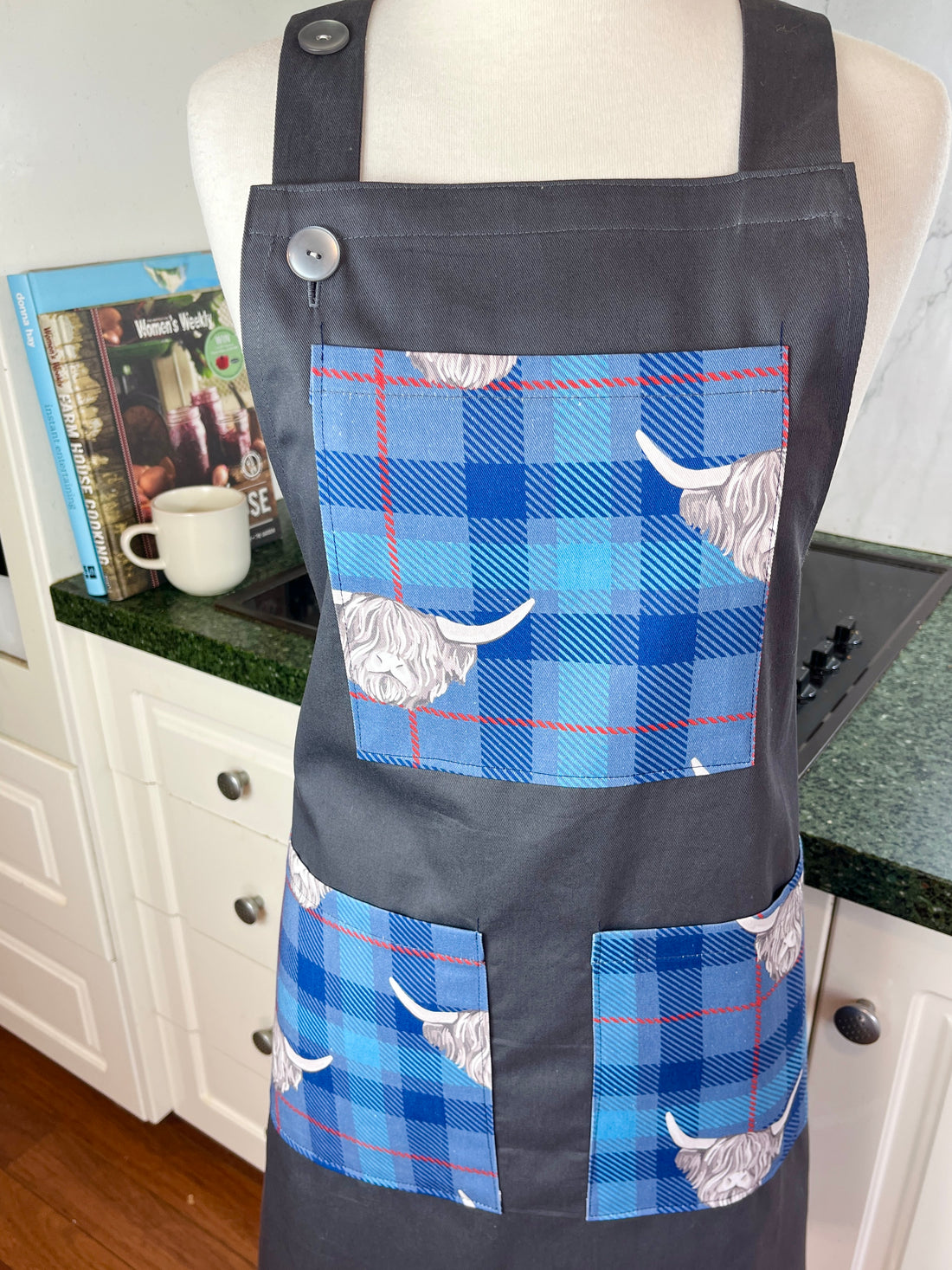 Highland Cows Make this Grey Apron Stand Out this Father's Day