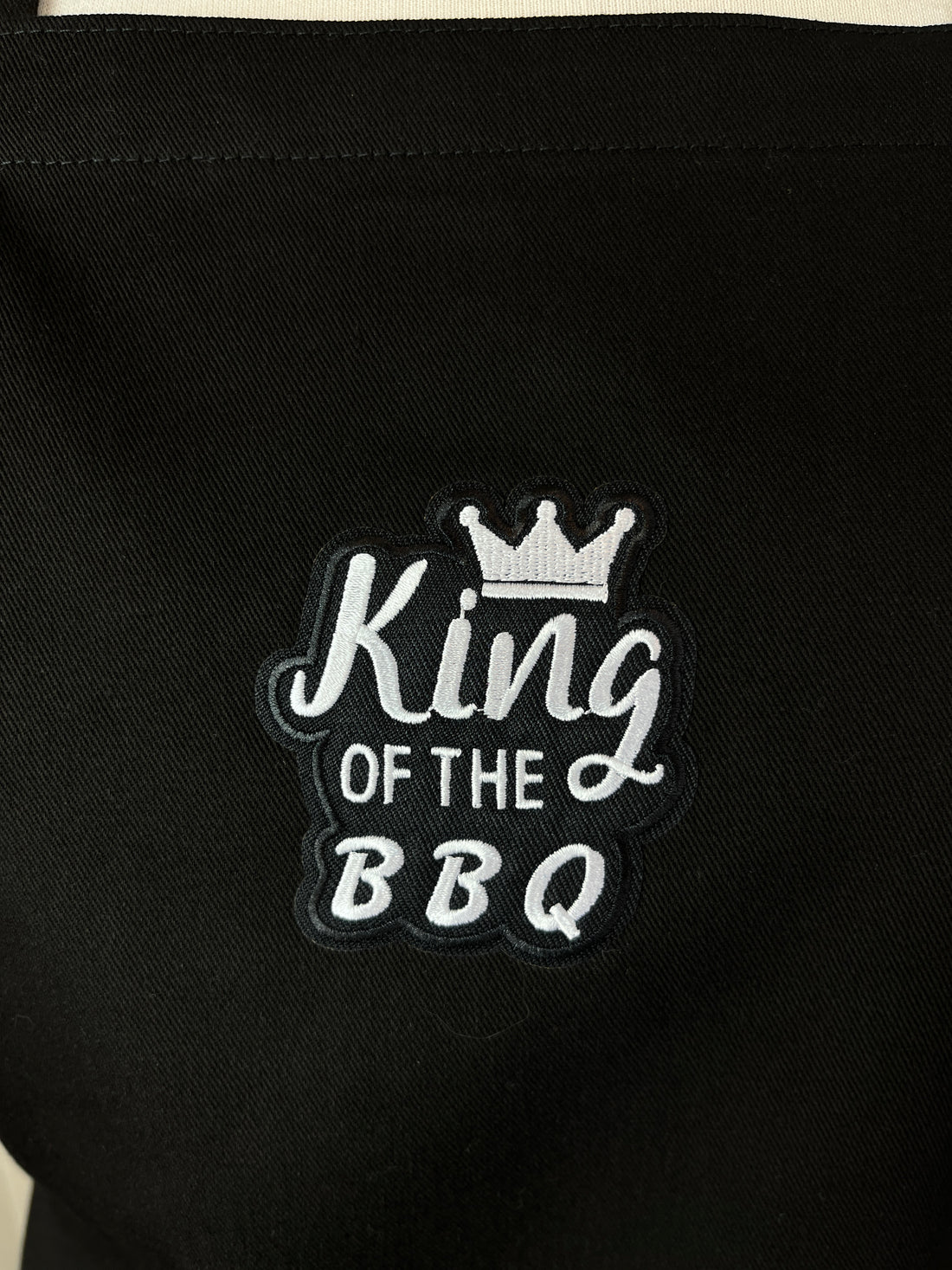 Is Your Dad the King of the BBQ? This Simple Black Apron is the Ideal Gift for Him