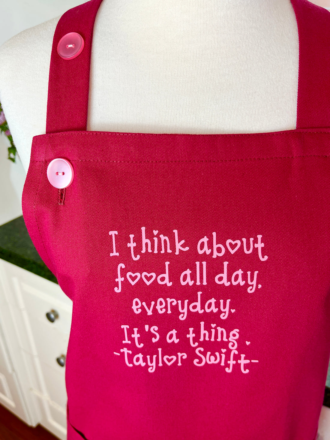 A Beautiful Dark Pink Apron with a Taylor Swift Twist