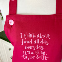 A Beautiful Dark Pink Apron with a Taylor Swift Twist