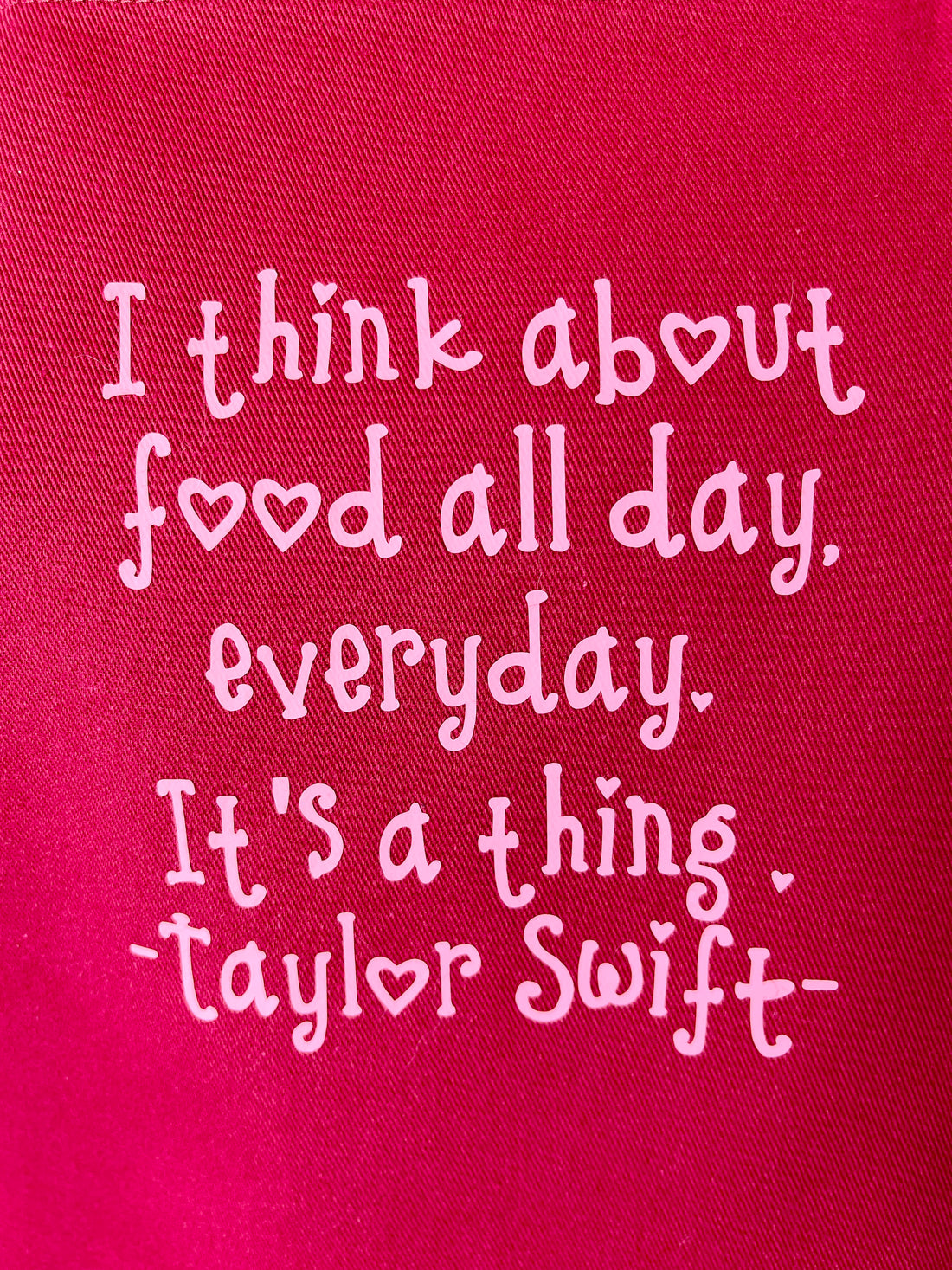 A Beautiful Dark Pink Apron with a Taylor Swift Twist