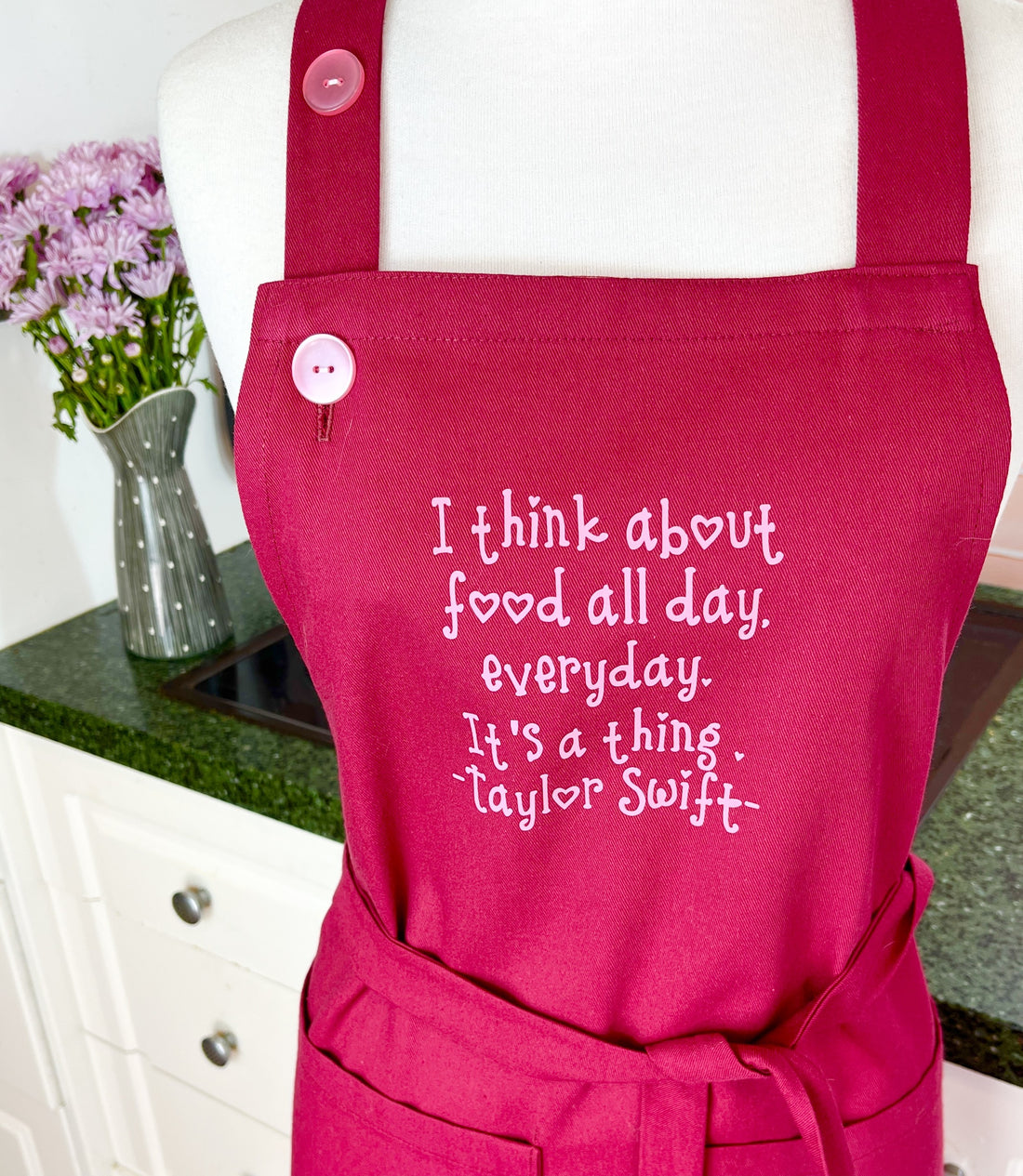 A Beautiful Dark Pink Apron with a Taylor Swift Twist