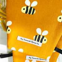 Big, Bold Bees Make a Beautiful Set of Two Oven Mitts