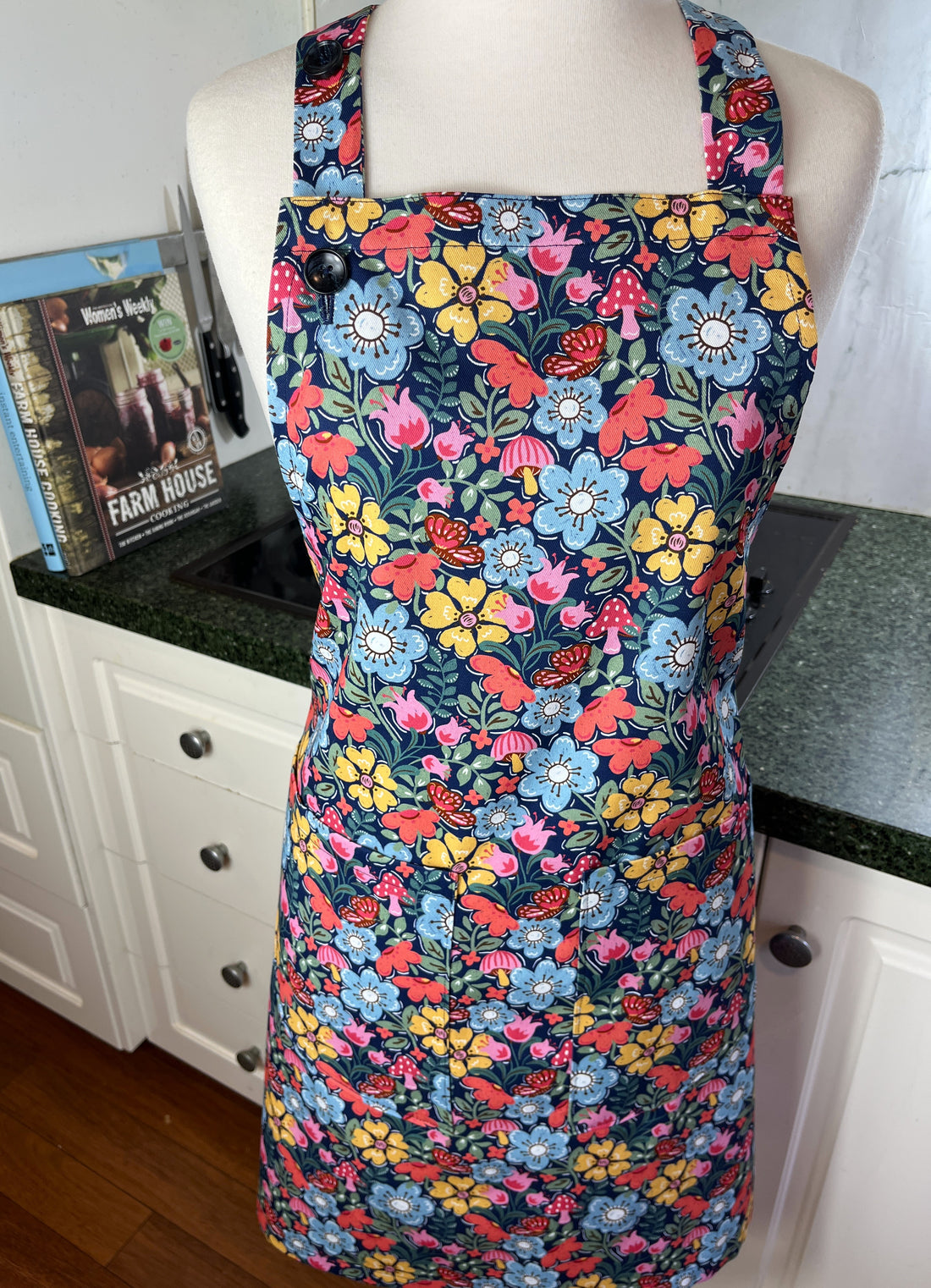 Hunt for the Adorable Butterflies and Mushrooms Within this Lovely Floral Apron