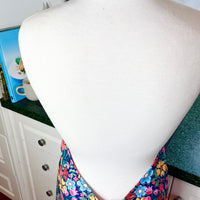 Hunt for the Adorable Butterflies and Mushrooms Within this Lovely Floral Apron