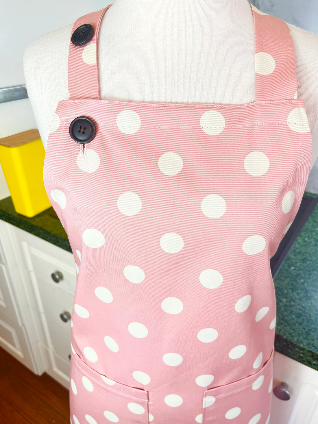 This Dusky Pink Apron is Adorned with Bold Beige Polka Dots