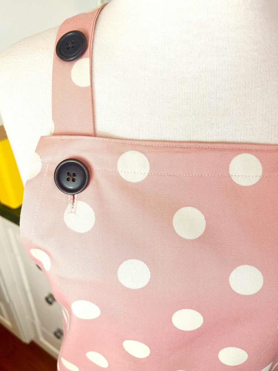 This Dusky Pink Apron is Adorned with Bold Beige Polka Dots