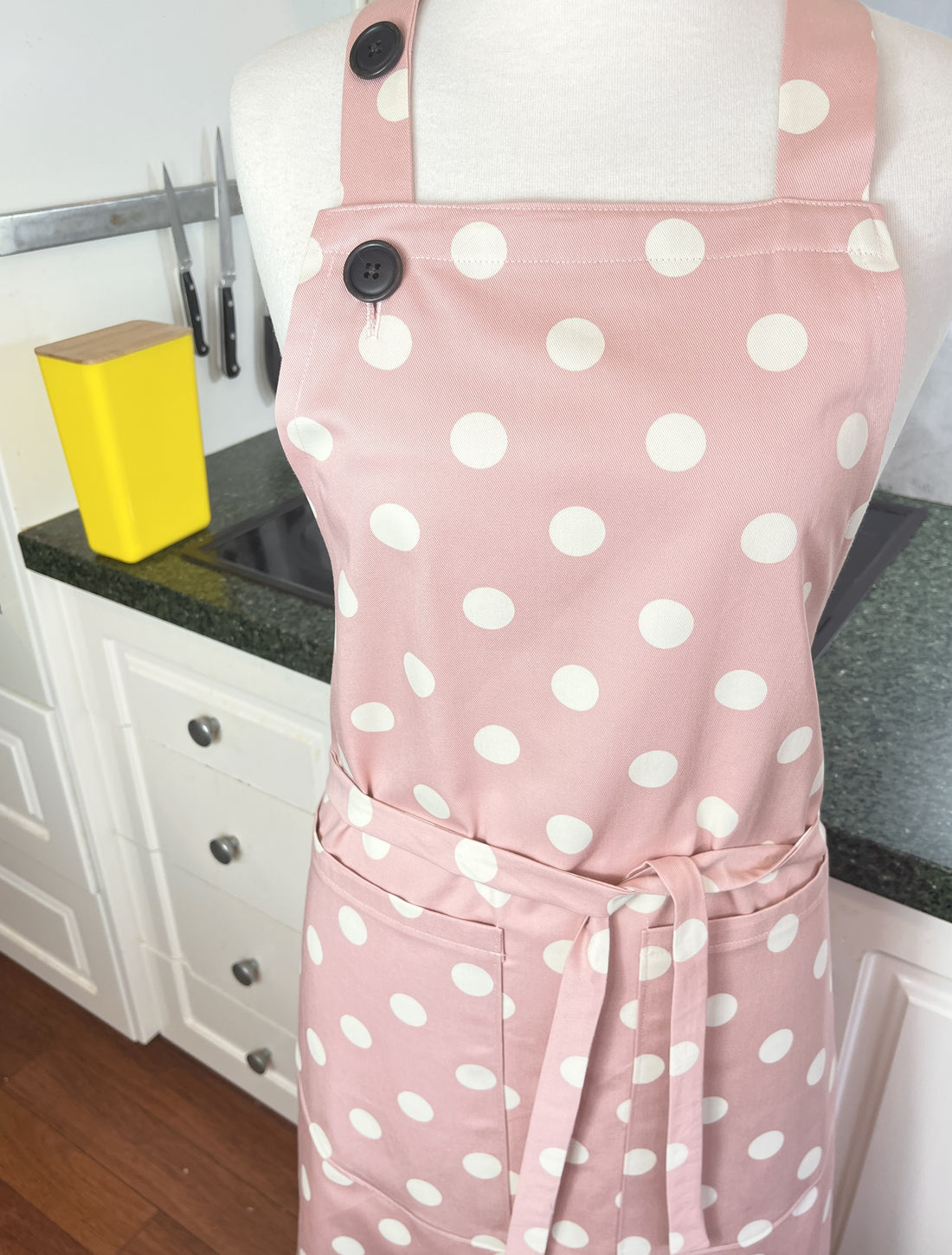 This Dusky Pink Apron is Adorned with Bold Beige Polka Dots