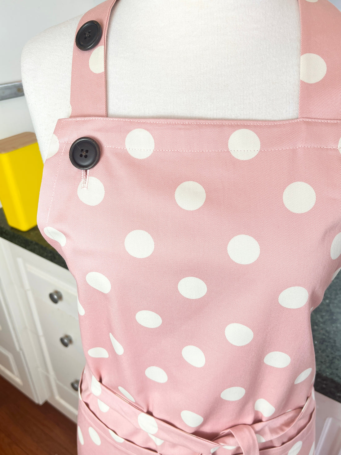 This Dusky Pink Apron is Adorned with Bold Beige Polka Dots