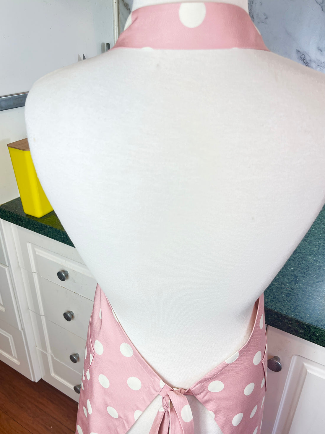 This Dusky Pink Apron is Adorned with Bold Beige Polka Dots