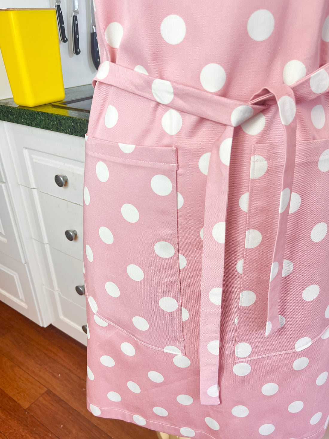 This Dusky Pink Apron is Adorned with Bold Beige Polka Dots