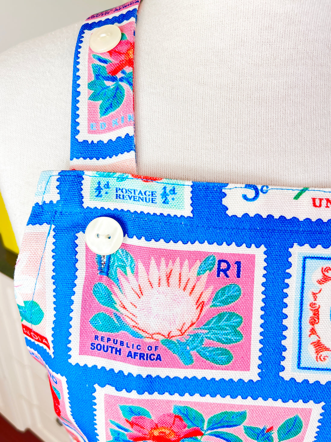 Lots of Vintage Stamps Make This Apron a Retro Delight