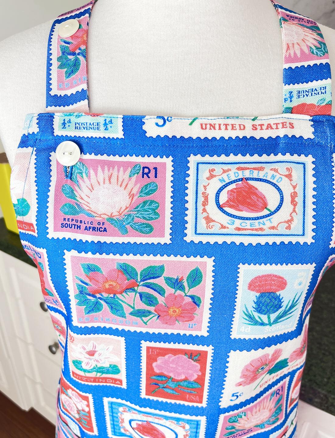 Lots of Vintage Stamps Make This Apron a Retro Delight