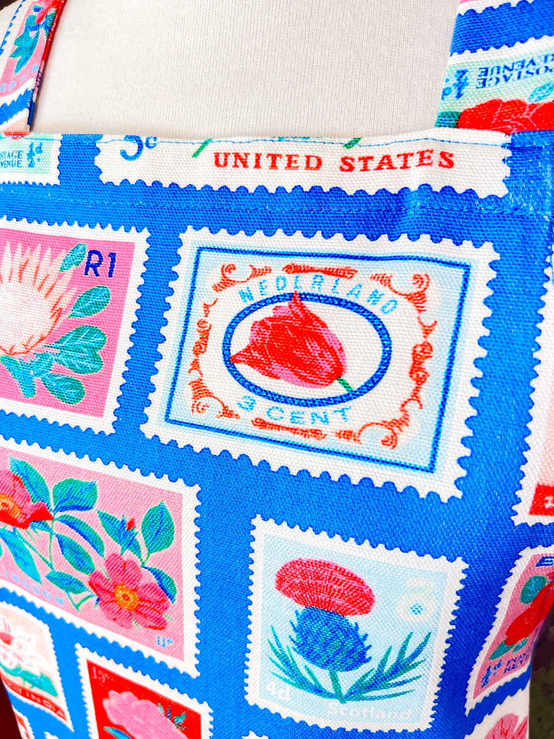 Lots of Vintage Stamps Make This Apron a Retro Delight