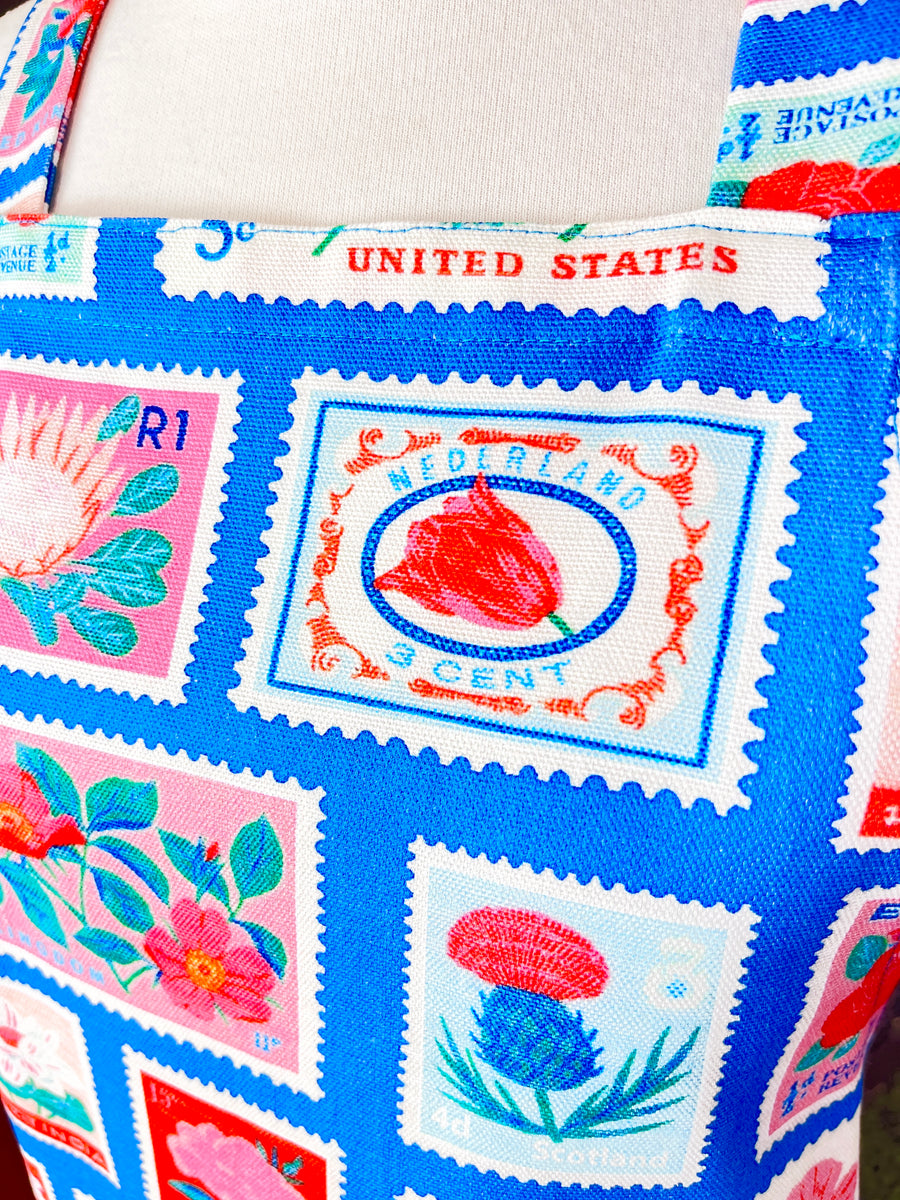 Lots of Vintage Stamps Make This Apron a Retro Delight