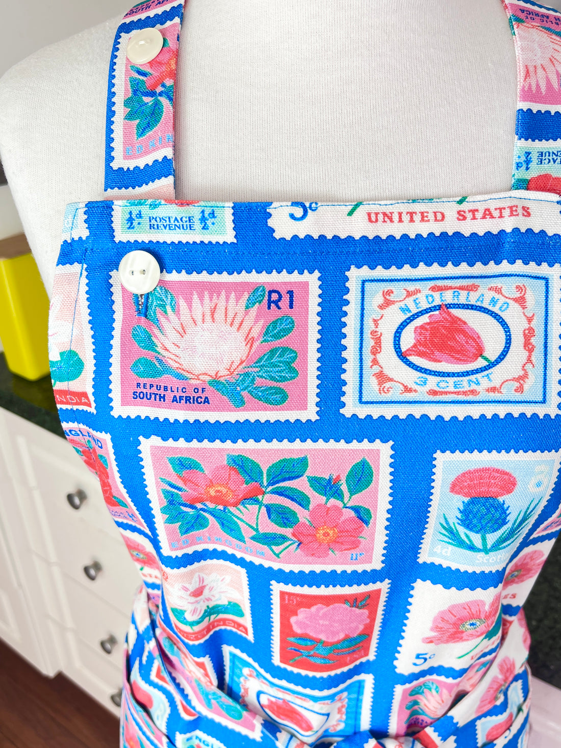Lots of Vintage Stamps Make This Apron a Retro Delight