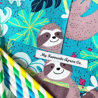 This Toddler's Apron is Covered in the Cutest Sloths